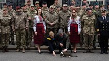 Ukrainian ambassador plays with Larry the cat outside 10 Downing Street