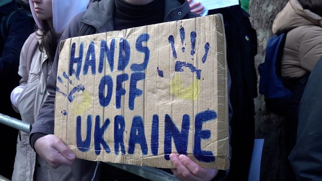 Hundreds of protestors march outside Russian embassy