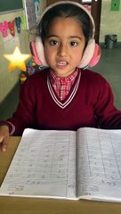 Akshu reading english alphabets in classroom-dm