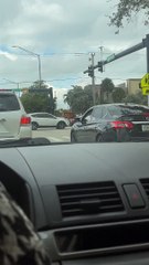 Bickering Drivers Throw Their Trash at Each Other