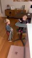 Baby Laughs at Older Brother Playing Peek-a-Boo