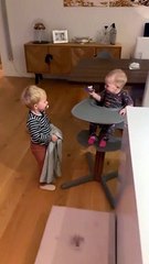 Baby Laughs at Older Brother Playing Peek-a-Boo