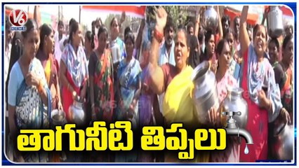 下载视频: Villagers Protest On Roads For Drinking water Issues | Karimnagar | V6 News