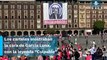 Colocan carteles y mega lona en contra de García Luna; ciudadanos a favor del INE la quitan