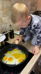 Kiddo Trying to Crack into a Pan Comes up Short