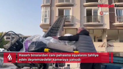 Ölümü göze alıp hasarlı binalardan eşya taşıdılar