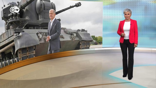 Скандал с цветами у танка: как подбитый российский Т-72 вызвал бурю эмоций в Берлине. DW Новости (27.02.2023)