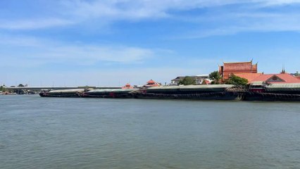 Tugboat and Barge passing at Koh Kret in Nonthaburi Thailand