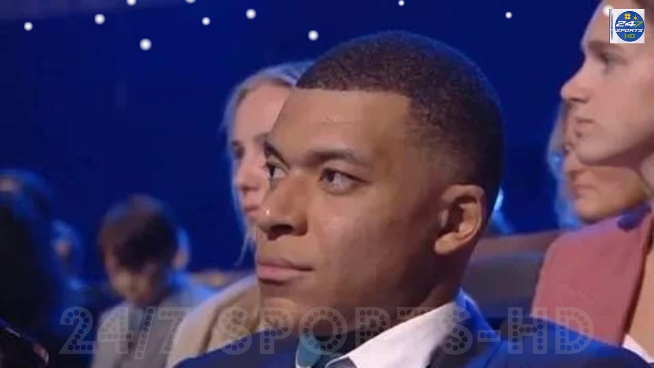 Kylian Mbappe gives a stony-faced reaction as Emi Martinez - who mocked the France and PSG star after the World Cup final - receives his goalkeeper prize at the FIFA Best awards