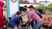 Kunjungi Lokasi Banjir, Kapolres Pekalongan Bagikan Sembako kepada Warga