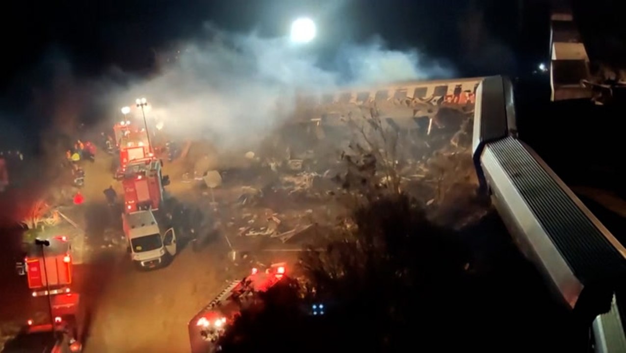 Smoke rises from train wreck after at least 32 killed by collision in Greece