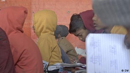 A slum-school under a flyover in New Delhi