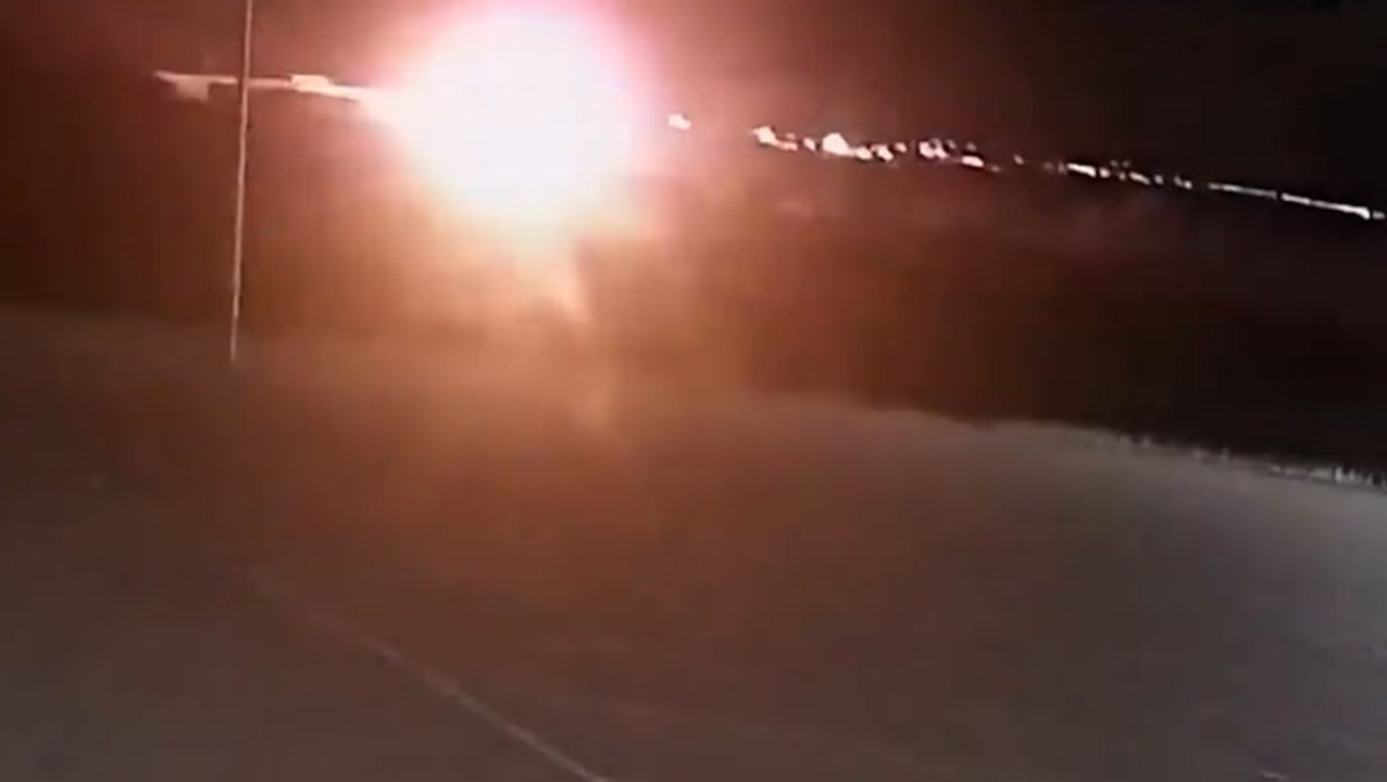 Moment passenger and freight trains burst into...