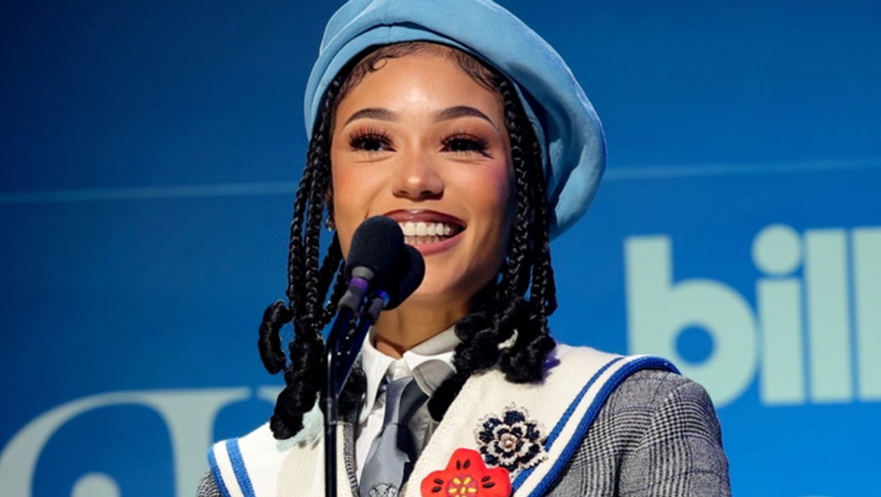Coi Leray Presents SZA With Billboard's Women Of the Year At Billboard 2023 Women In Music Award