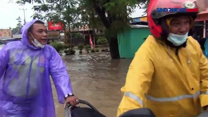 Download Video: Jalur Lintas Timur Km 14 Sukajadi Talang Kelapa Terendam Banjir