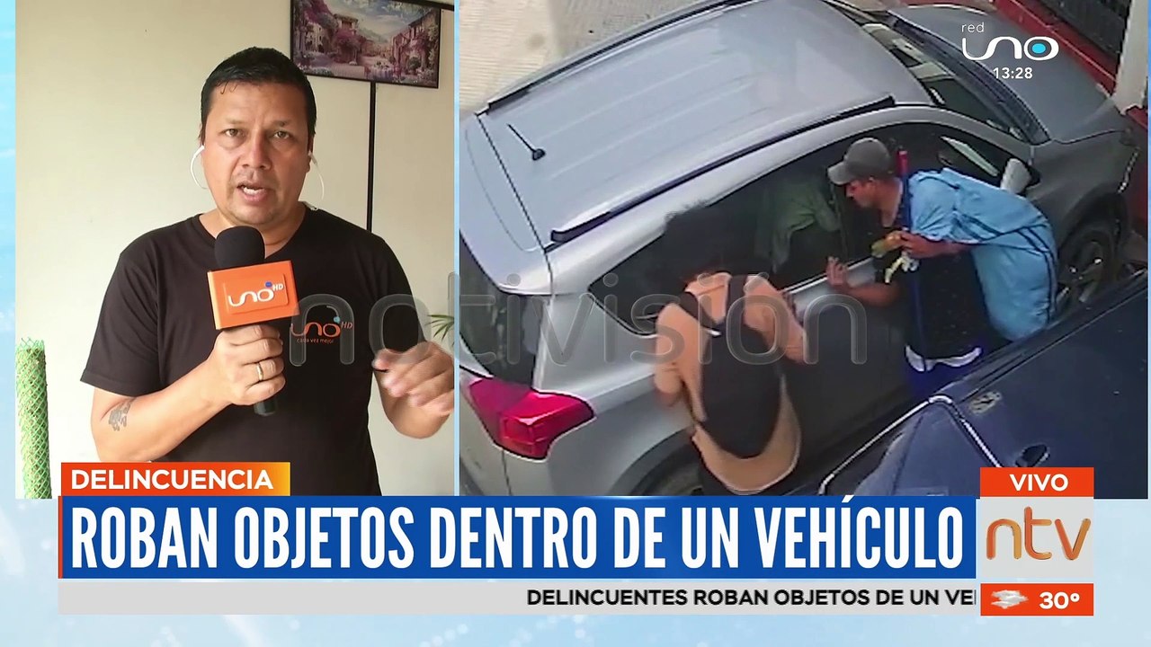 Delincuentes sustraen objetos dentro de un vehículo estacionado