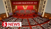 China opens parliament, setting modest growth target of about 5%