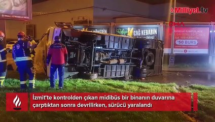 Bina duvarına çarpan midibüs devrildi