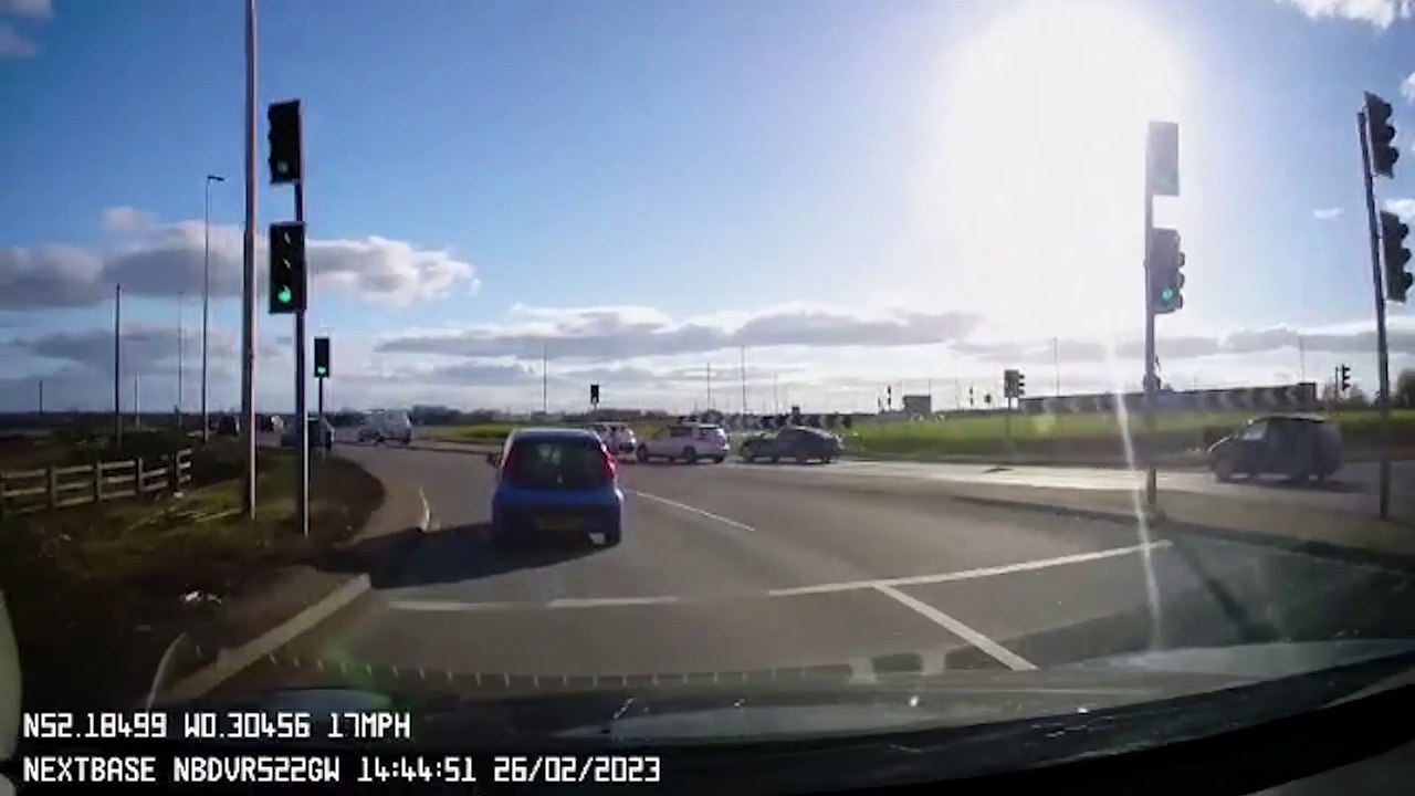 Footage captures motorcyclist falling off his bike while attempting wheelie on a roundabout