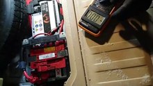 How to test battery voltage on BMW X5 E70?