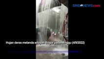 Talang Air Meluap Ciptakan Air Terjun di Jalan Bogor