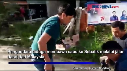 Video herunterladen: Detik-detik Polisi Tangkap Diduga Kurir Narkoba di Jalan Nunukan