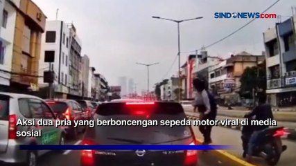 Viral! Aksi Pria Ambil Ponsel dari Mobil yang Berhenti di Lampu Merah Roxy