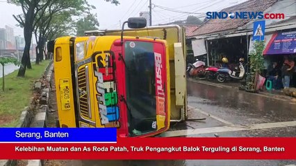 Descargar video: Kelebihan Muatan dan As Roda Patah, Truk Pengangkut Balok Terguling di Serang, Banten