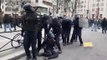 WARNING: Police in France retreating as protesters throw rocks during pension reform protests