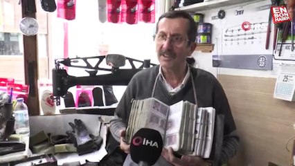 Eskişehir'de ayakkabı tamircisi, müşterilerinin vesikalıklarını topluyor