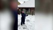 Moment boy knocks himself out during snowball fight