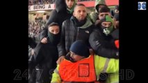 Real Betis fans clash with police in ugly scenes during the final minutes of their Europa League defeat by Manchester United... with away fans appearing to try and climb into the home section