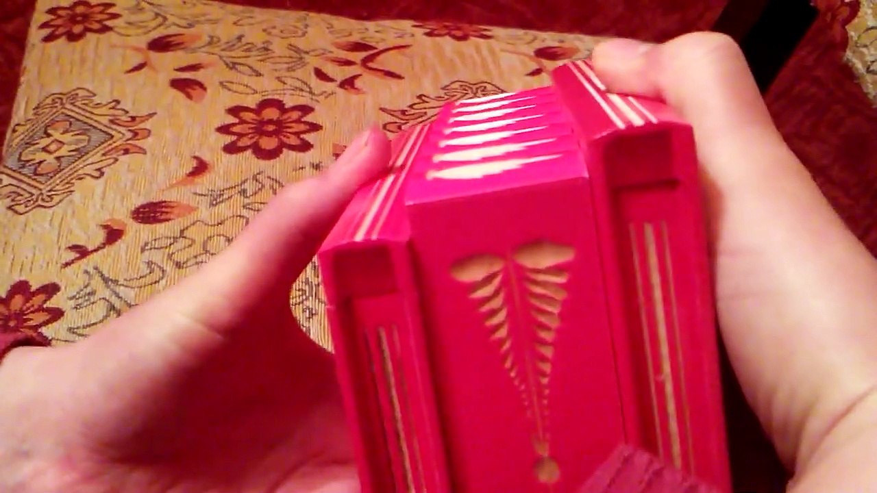 How do you open a wooden magic puzzle box with hidden key secret