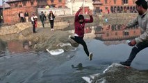 Woman Fails to Clear Jump Across Water