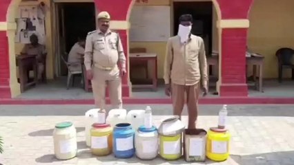 बदायूँ:पुलिस ने एक व्यक्ति को 60 लीटर अवैध कच्ची शराब के साथ किया गिरफ्तार
