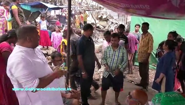 Philanthropist Nilotpal Mrinal distributed food packets to the fire effected families of Appa Pada in Malad