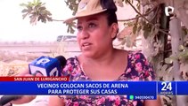 Ciclón Yaku en Lima: Vecinos de SJL colocan sacos de arena para proteger sus casas