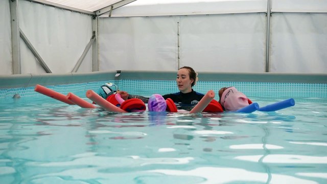 Preston school pupils swimming in the playground
