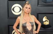 Paris Hilton says she loves the challenge of motherhood