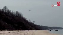 Plaja acil iniş yapan uçak denize sürüklendi