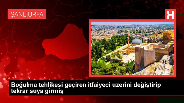 Boğulma tehlikesi geçiren itfaiyeci üzerini değiştirip tekrar suya girmiş