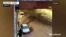 Extreme flooding in Turkey sweeps away road