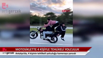 Motosikletteki 4 kişinin tehlikeli yolculuğu kamerada