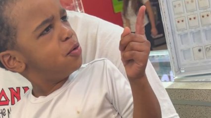 Kid's over-the-top reaction to getting his ear pierced will make you spit your coffee out