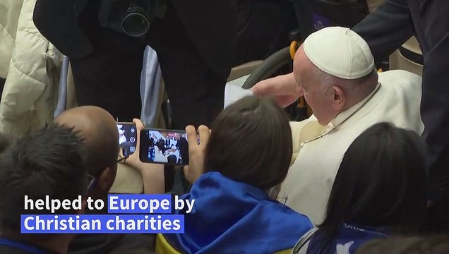 Pope greets refugees helped through Christian 'corridors'