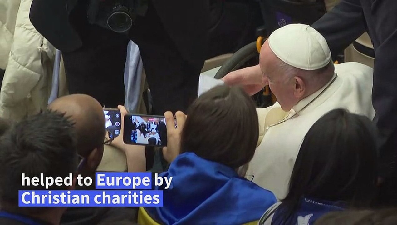 Pope greets refugees helped through Christian 'corridors'