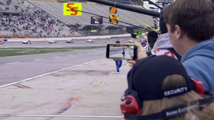 Josh Williams parks car at start/finish line, walks to garage