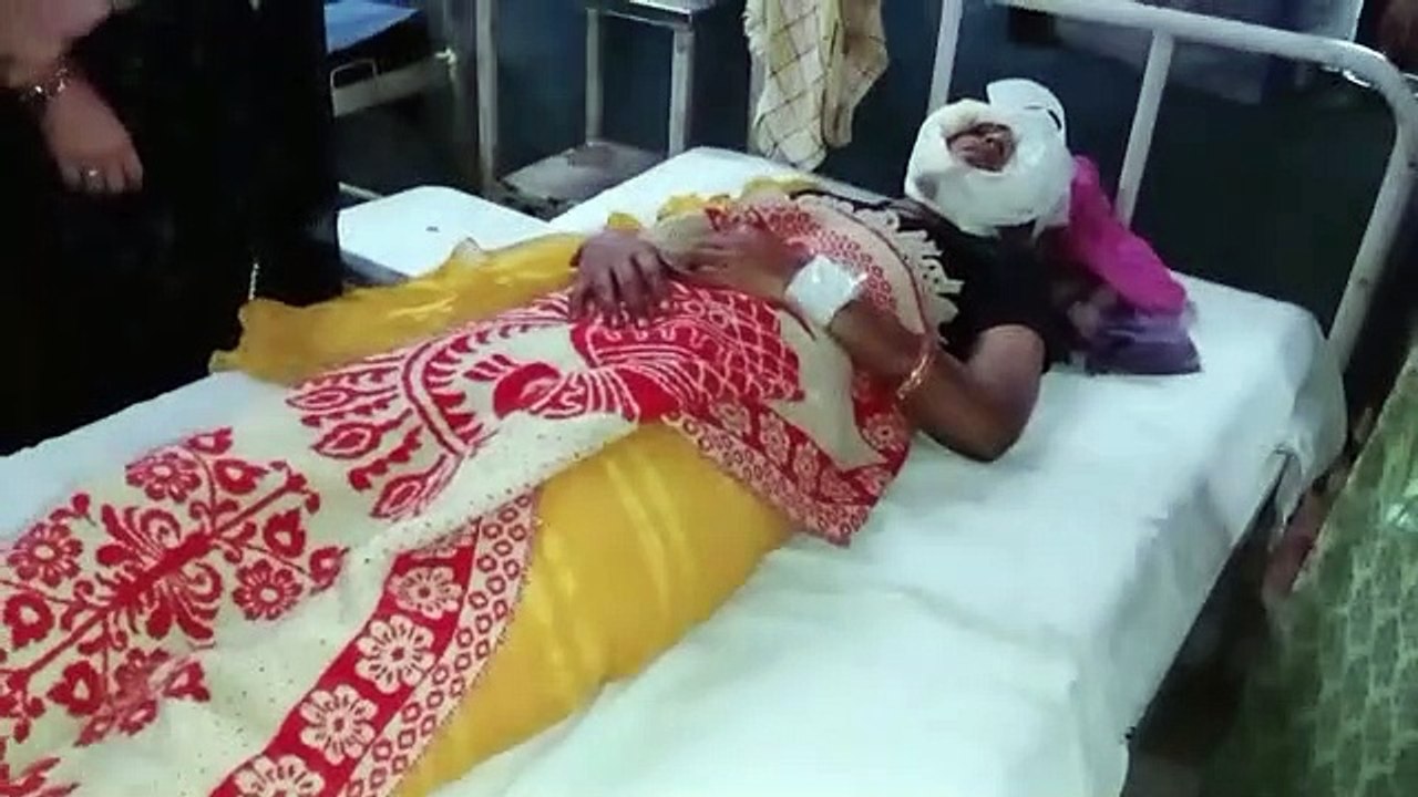 Neighbors quarrel, woman attacked with sword