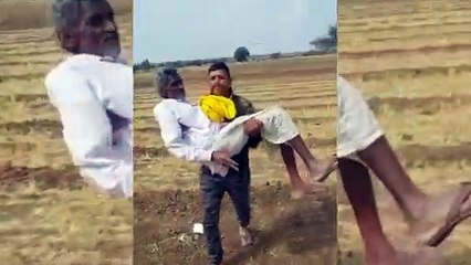 The constable took the old man suffering in the field in his lap and b