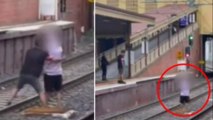 Heartstopping Moment_ Good Samaritan Risks His Life To Save  Man Standing On Train Tracks